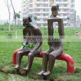 Bronze Abstract Figures Sitting on Bench Sculpture