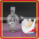 glass skull bottle with child proof dropper