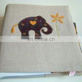 linen book cover with applique elephant