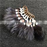New Fashion Retail Lifelike Raccoon Fur Ball Leather Tassel Phone Holder