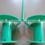 Green plastic barrel for welding wire