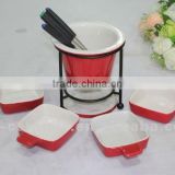 red glazed ceramic chocolate fondue set