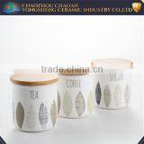 White Decaled Ceramic Canisters Set With Wooden Lid 3pcs thumbnail-1