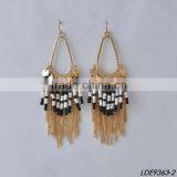 Gold Disc With Colorful Bead and Gold Tassel Earrings thumbnail-3