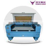 LK1480 Factory Price Hanniu Co2 Garment Clothing Laser Cutter for Sale thumbnail-1