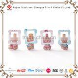 Polyresin Baby Sculpture With Chair Shoes Horse Photo Frame Leaf Holding Baby Figurine Resin Cute Baby Statue thumbnail-4