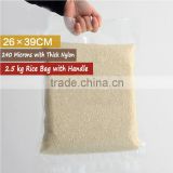Chinease Manufacturer Best Price Custom Printed Plastic Customized Vacuum Rice Packaging Bags With Die Cut Handle