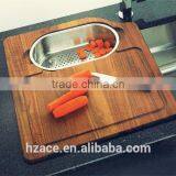 Solid Wood Cutting Board With Polished Stainless Steel Colander thumbnail-1