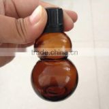 Unique Shaped Amber Boston Round Glass Bottles thumbnail-4