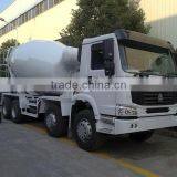 HOWO 8x4 31ton Self-loading Concrete Mixer Truck thumbnail-1