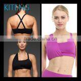 Kiteng comfortable yoga sports bra with crisscross stapes on the back wicking fabric and padding Office In United States