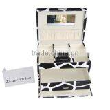 The Cow Grain Faux Leather Portable Jewelry Storage Box With Mirror thumbnail-1