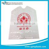 Disposable Plastic Adult Bibs With Crumb Catcher and Ties thumbnail-1