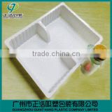 Disposable plastic meal tray with compartment