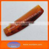 Plastic Amber Comb