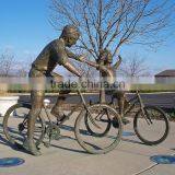 Bronze Foundry Father and Daughter Bicycle Sculpture in Westerville thumbnail-1