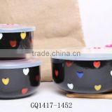 black glaze custom ceramic bowl with colorful dots