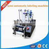 Professional Semi- Automatic Two Sides Round Bottle Labeling Machine With CE and Factory Price thumbnail-1