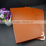 A4 brown leather 3 ring notebook with silver metal corner