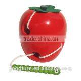 Wooden Caterpillar Eating Red Apple thumbnail-2
