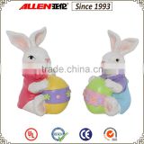 4.5" bright color sitting resin rabbits figurine holding Easter egg, rabbits for Easter decoration 2 sets