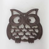 Cast iron owl table trivet