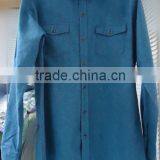 Men's blue long sleeve shirt with two chest pockets and metal button