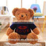 lovely sitting brown plush long fur teddy bear with sweater