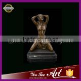 nude woman cover eyes bronze sculpture