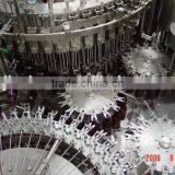 Автоматическая трехфункциональная машина для наполнения и укупоривания стеклянных бутылок с пивом thumbnail-2