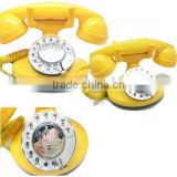 old fashioned retro telephone with rotary dialing keys