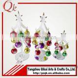 White handmade glass christmas tree with beautiful ornaments