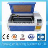 shandong man co2 mini small size desktop acrylic laser engraving cutting machine