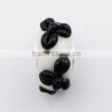 Glossy Black Relief Of Flowers On White Murano Glass Bead thumbnail-1