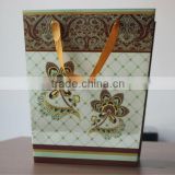 High quality 3D stamping paper shopping bag with ribbon handle