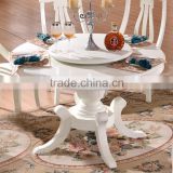 Restaurant pretty and graceful French round dinner table with lazy susan