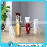 simple design clear good quality customized acrylic skin care stand for cosmetic display cheap