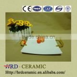 Factory supply stock cheap square white ceramic plate with Metal handle