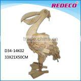 Large indoor decorative wooden pelican statue