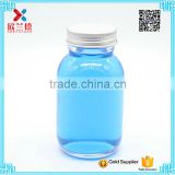 clear round pharmaceutical pill glass bottle with the sliver cap 150ml
