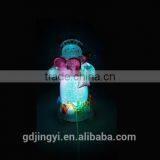 Holding a Red Heart Acrylic Snowman With LED Light thumbnail-3