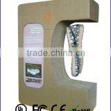 Auto Spinning and Floating Shoes Display Made From Kraft