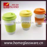 CERAMIC TRAVEL COFFEE CUP WITH SILICONE LID & SLEEVE thumbnail-1