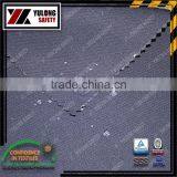Flame Retardant And Fluid Repellant Fabric For Garment