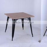 xavier pauchard dining table with wooden top for dining room
