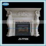 white marble fireplace mantel of lady carving