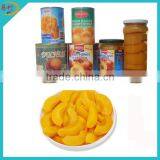 Canned yellow peach dices in syrup