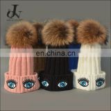 China Supplier Unisex Knitted Oxeye Embroidery Hats With Raccoon Fur Pompoms Balls Caps