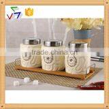 3pcs Ceramic Canister Set With Embossed Design & Bamboo Stand thumbnail-1