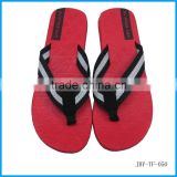 Rubber flip flop with fabric strap